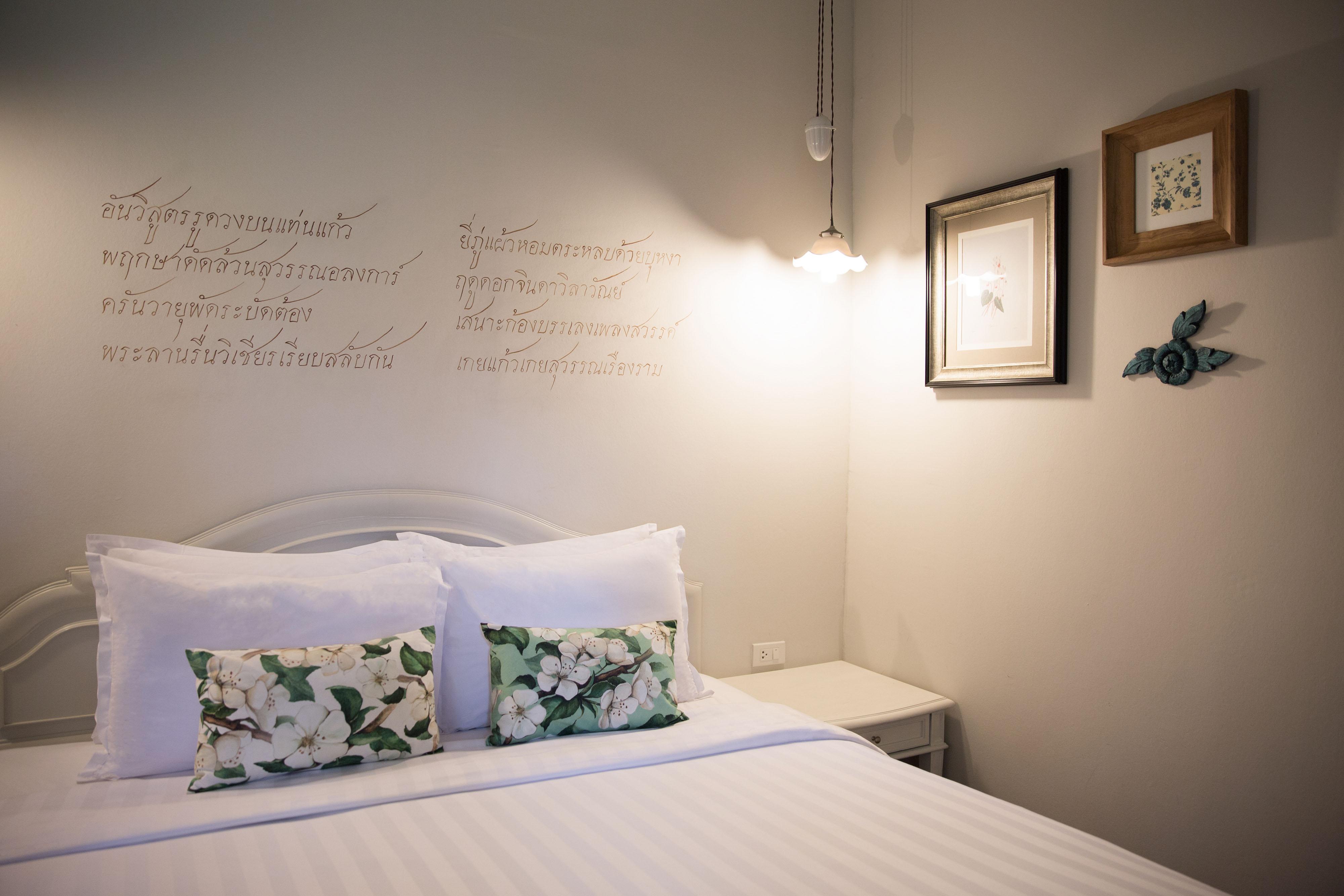 فندق ذا راوييكانلايا بانكوك المظهر الخارجي الصورة A bedroom at the hotel