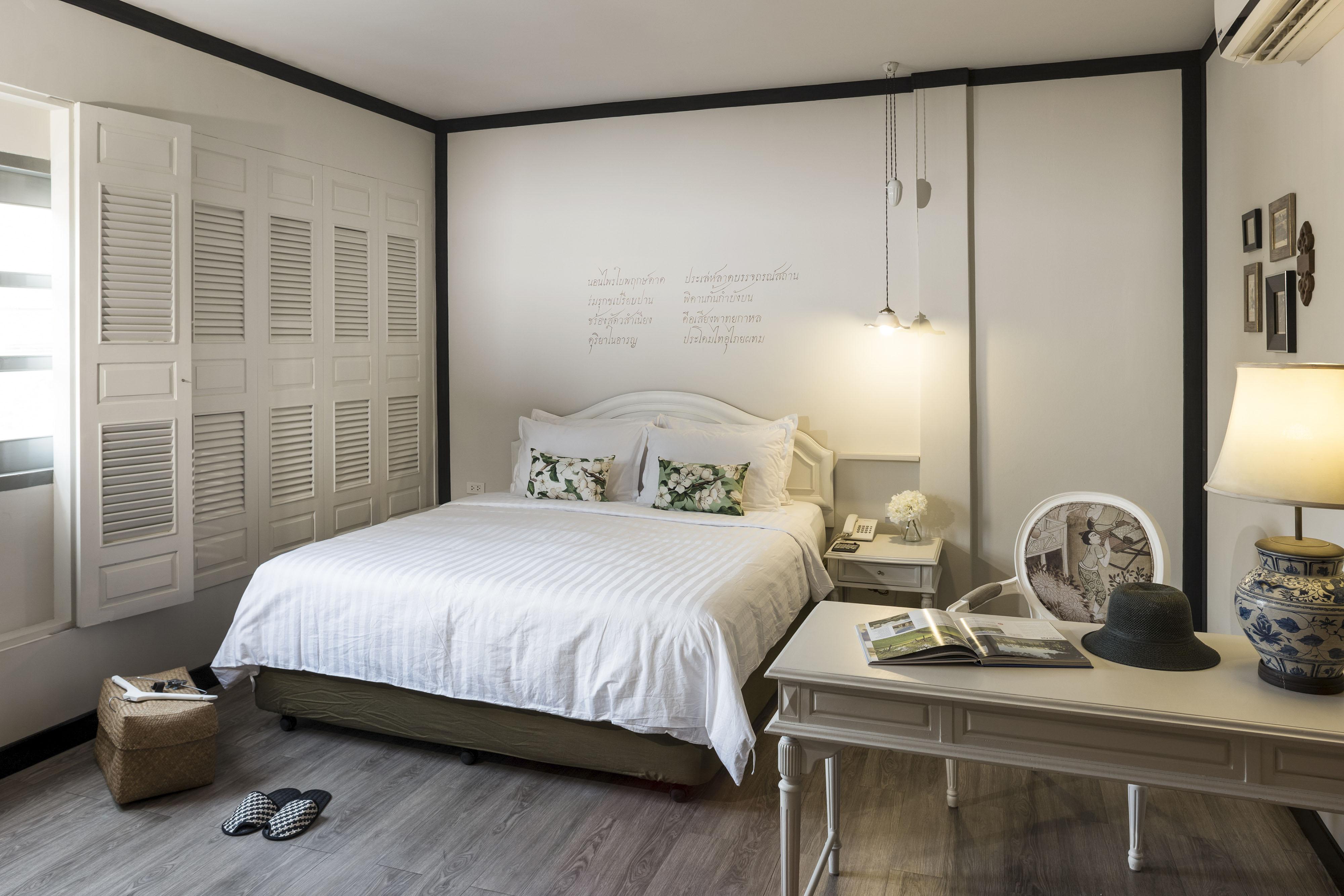 فندق ذا راوييكانلايا بانكوك المظهر الخارجي الصورة A bedroom at The Library