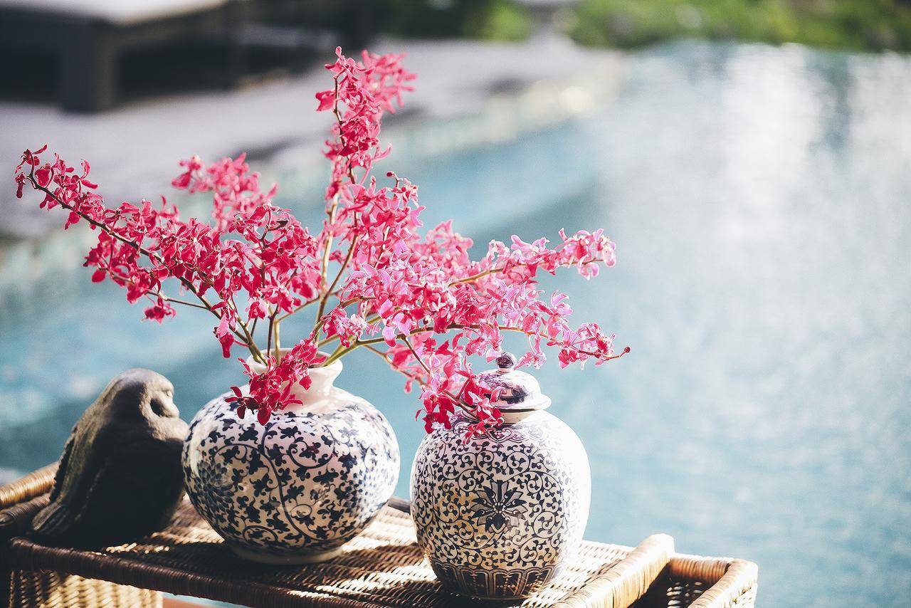 فندق ذا راوييكانلايا بانكوك المظهر الخارجي الصورة Vases of flowers