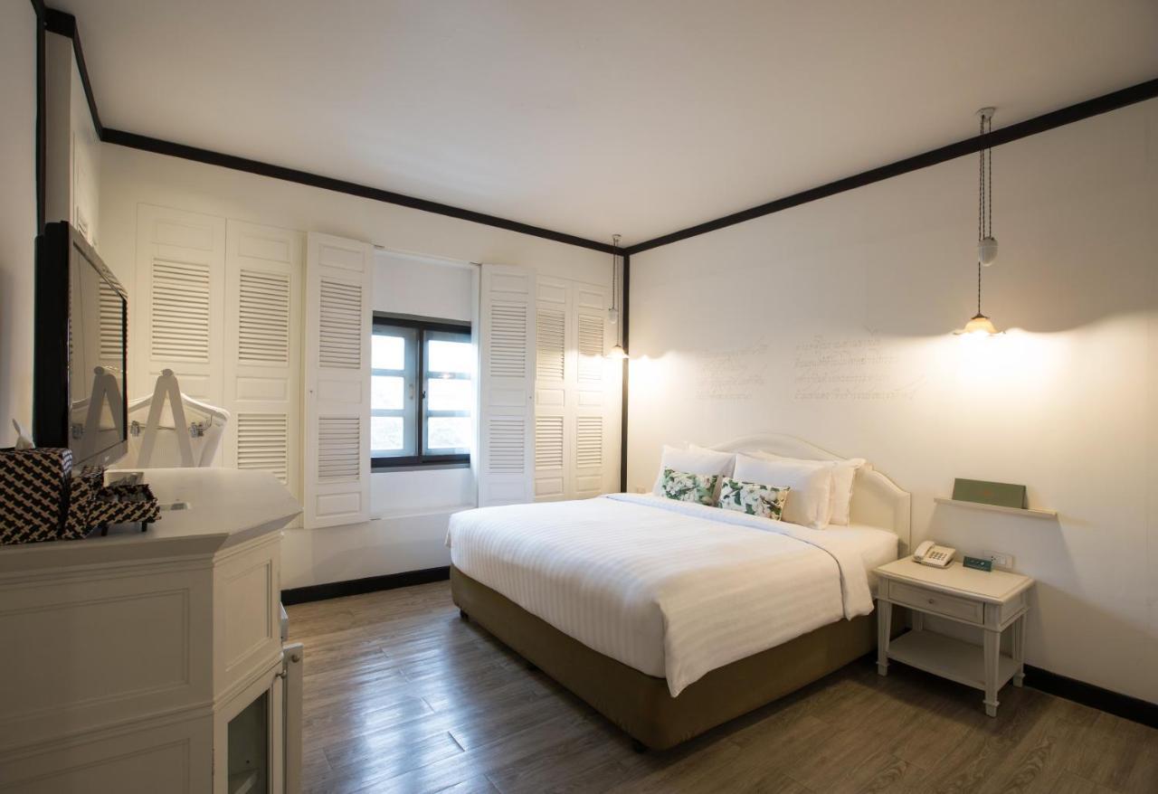 فندق ذا راوييكانلايا بانكوك المظهر الخارجي الصورة A bedroom at the hotel