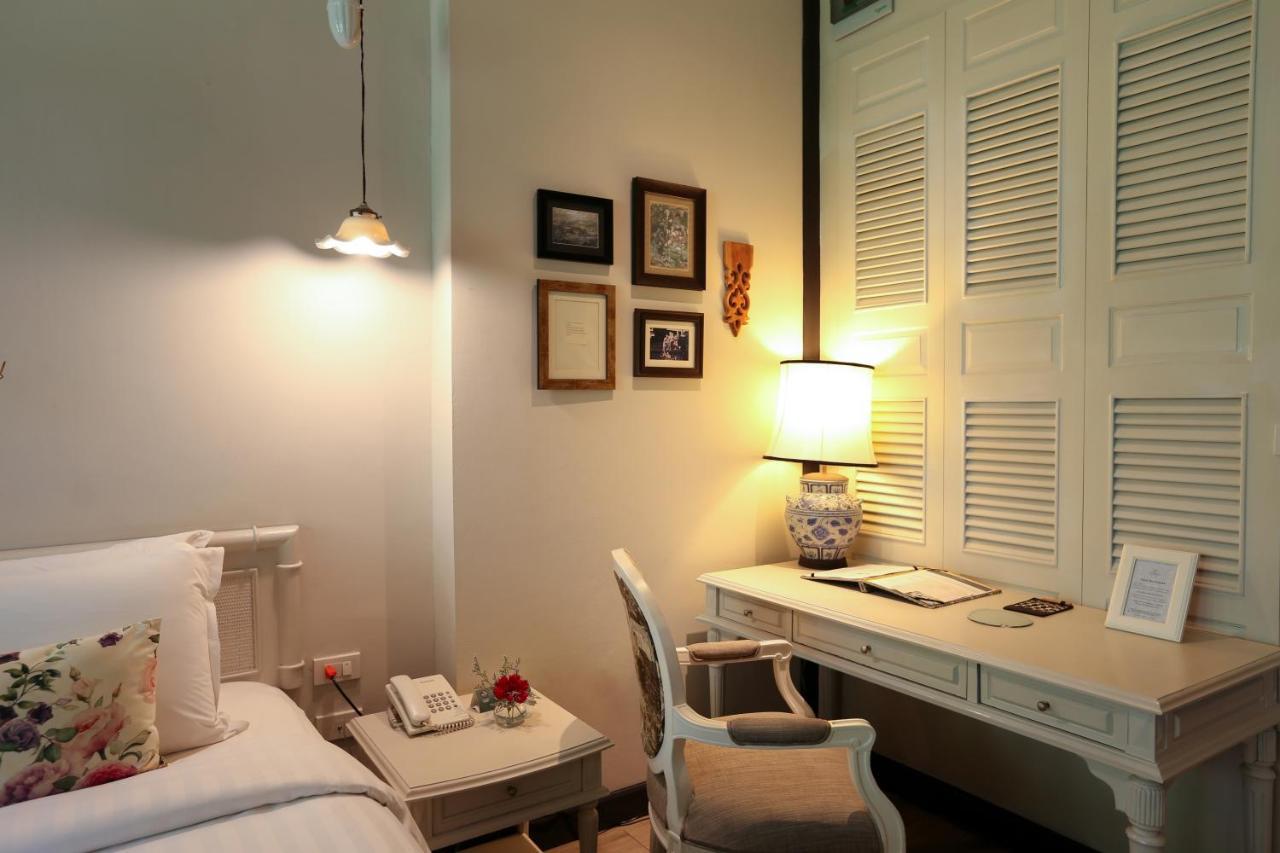 فندق ذا راوييكانلايا بانكوك المظهر الخارجي الصورة A bedroom at the hotel