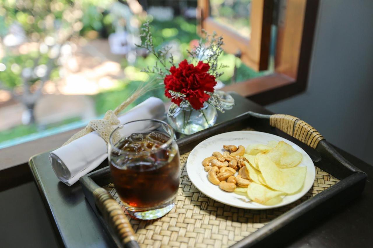 فندق ذا راوييكانلايا بانكوك المظهر الخارجي الصورة A glass of Oolong tea